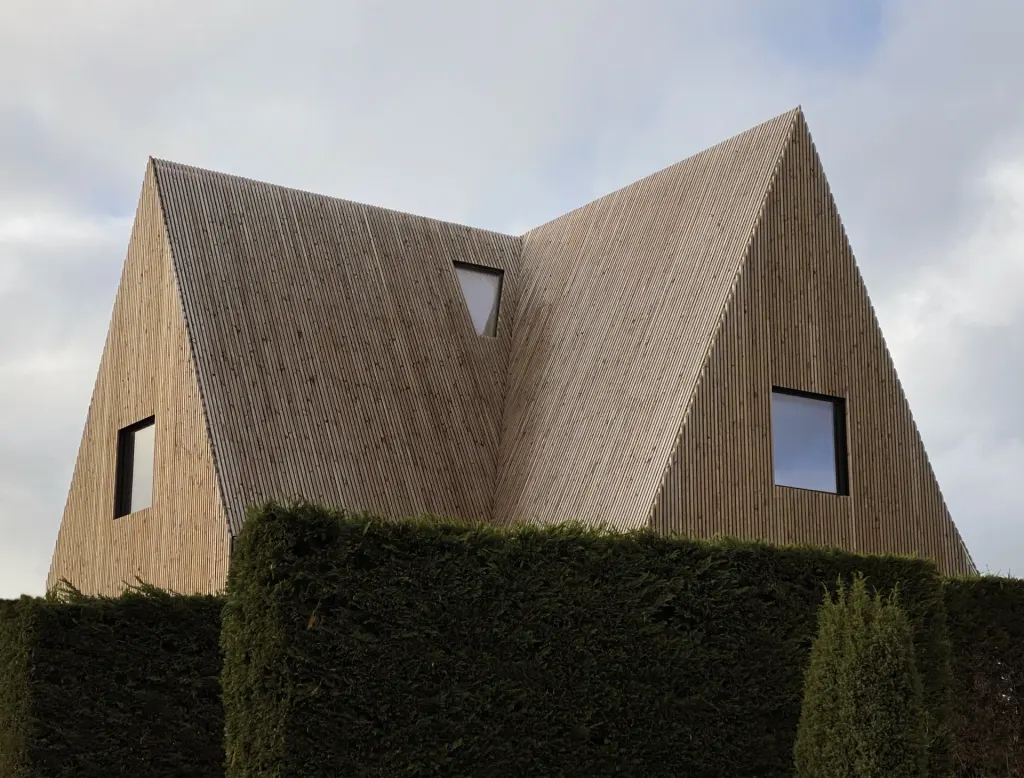 The house is clad in Douglas-fir battens