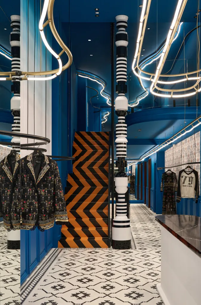 the interior design serves as a physical manifestation of the fashion brand’s dual identity