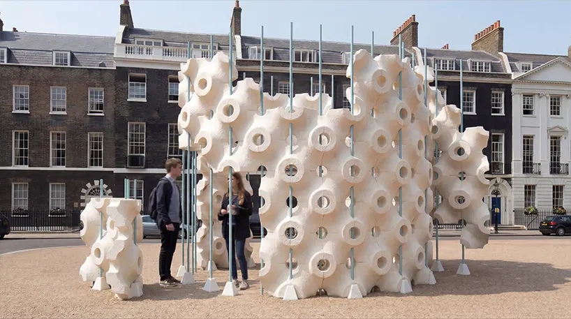 varying module heights and openings allow the pavilion to respond to different paths and viewpoints