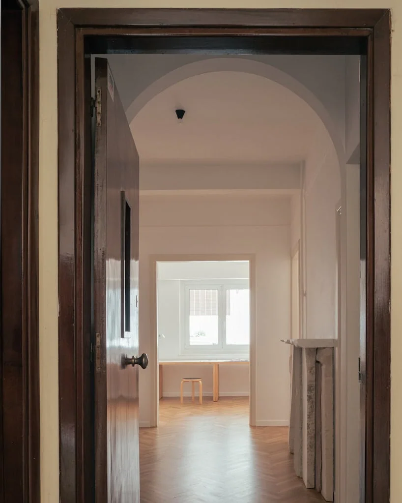 the entrance lobby featuring marble sculpture by Theodore Psychoyos