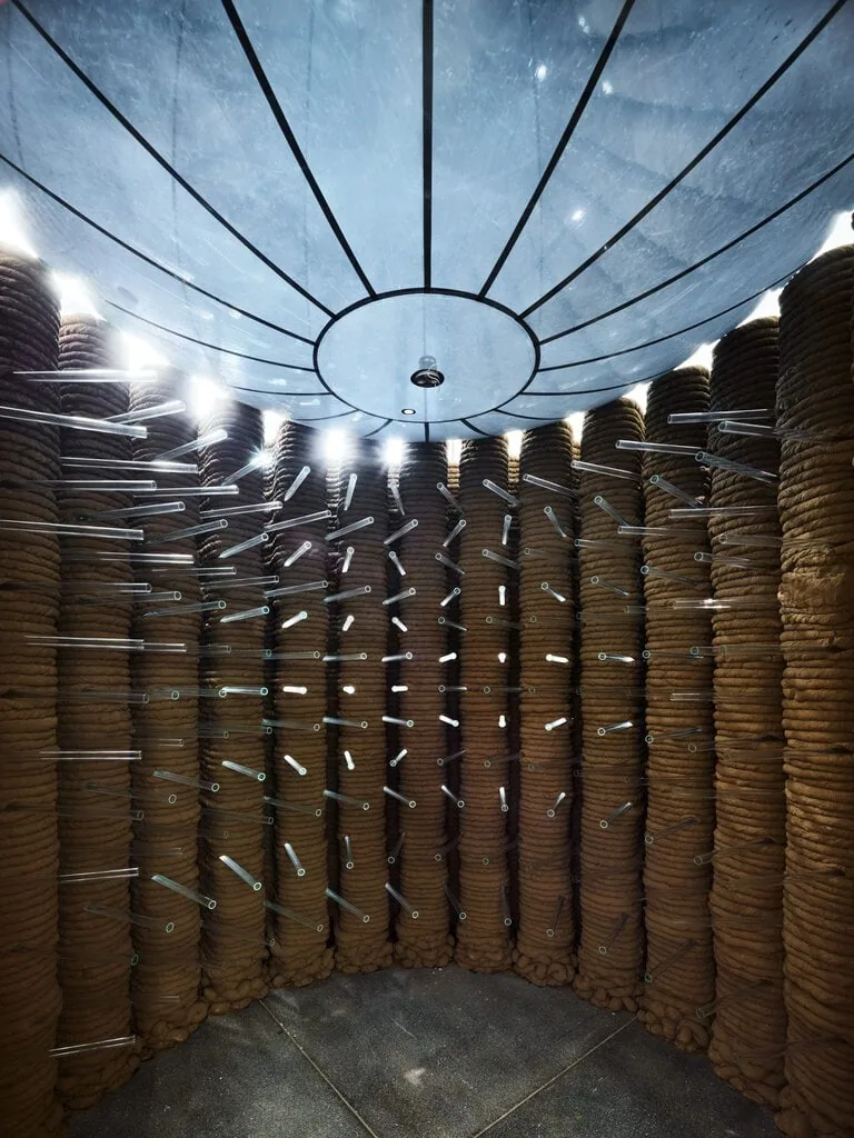 The earthen walls of Sanctuary are punctuated with tubes from a defunct solar company
