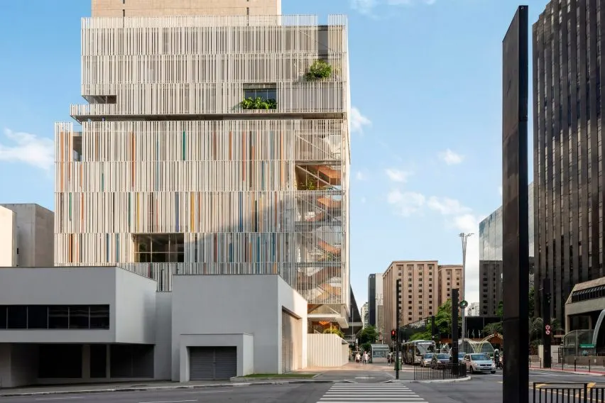 The slender building will be wrapped in white louvres