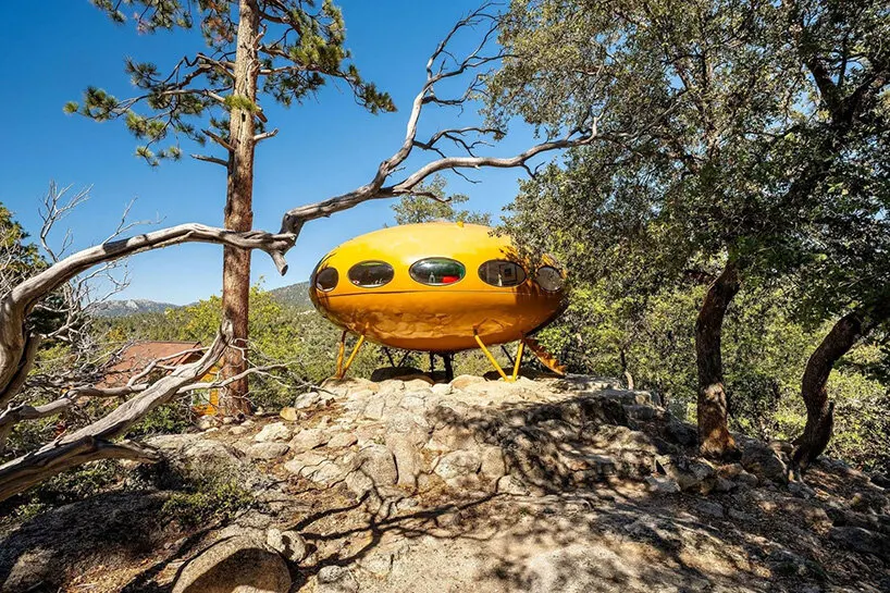 oval windows punctuate the glossy fiberglass shell of the Futuro house