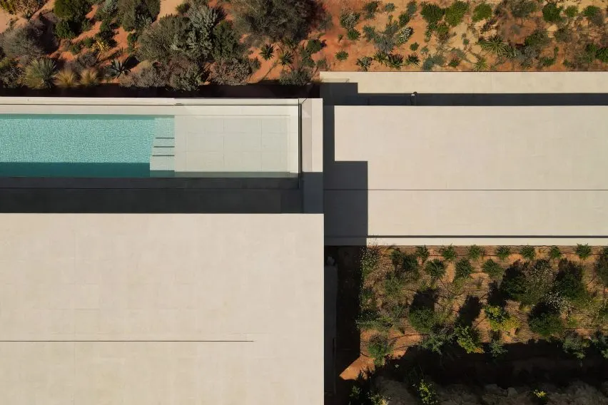 It features a terrace with a pool