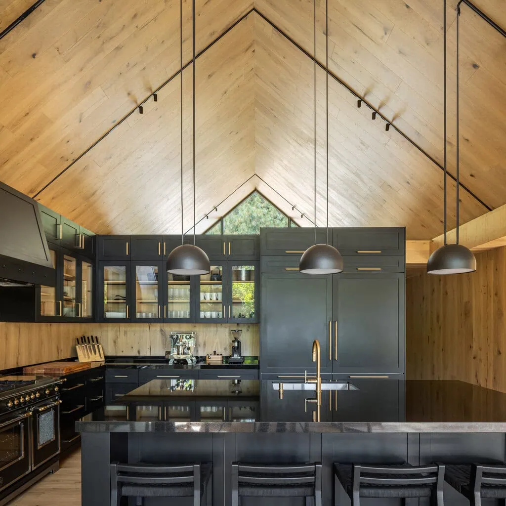 Dark grey cabinetry was used in the interior