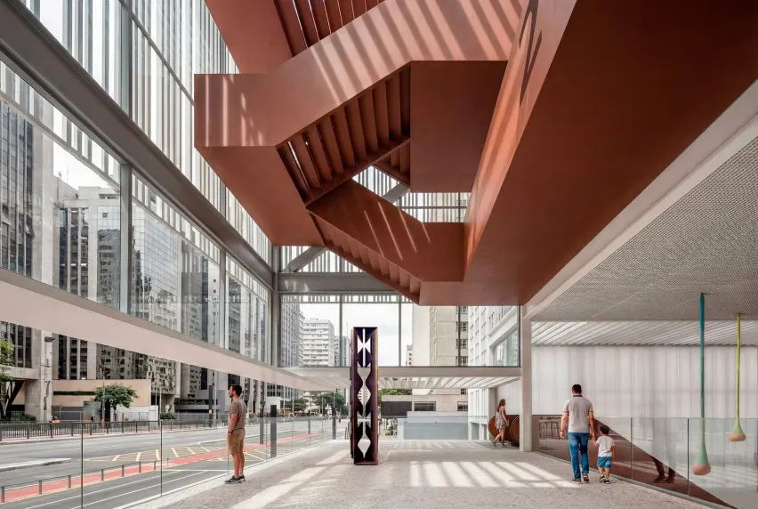A massive terracotta-informed staircase will sit at the front of the building