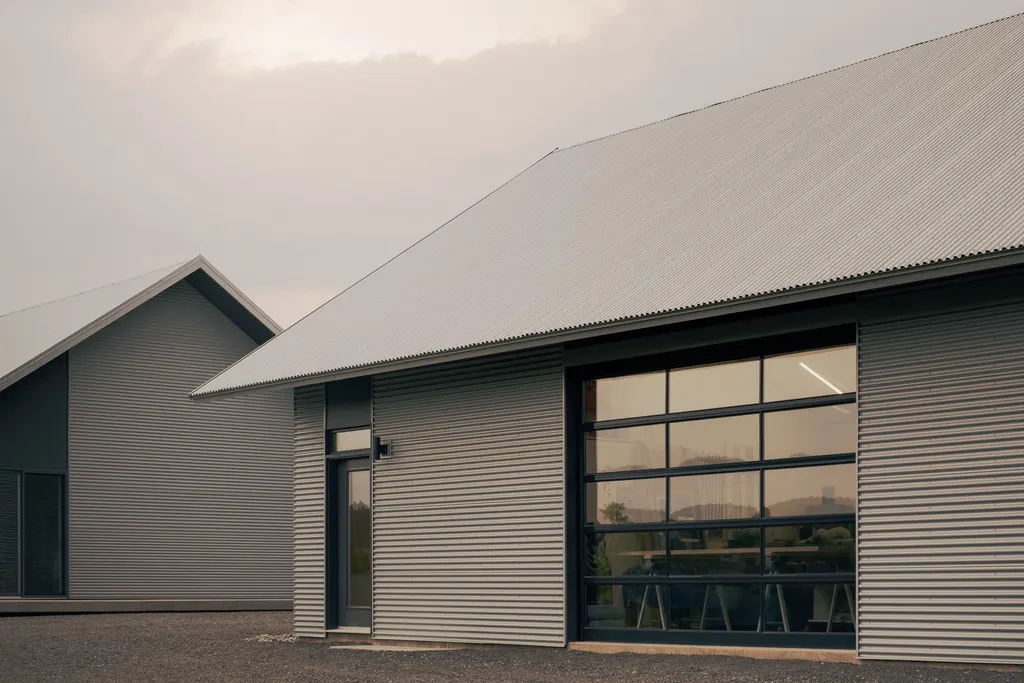 The structures are clad in corrugated metal