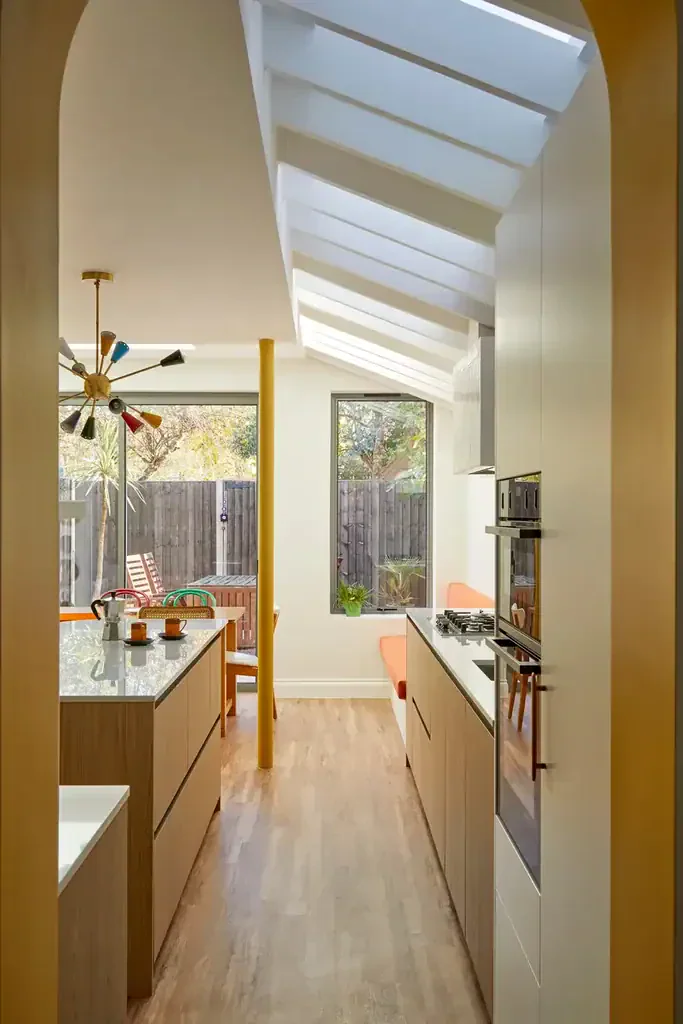 interior of West London extension Ealing return, a colourful modern kitchen addition