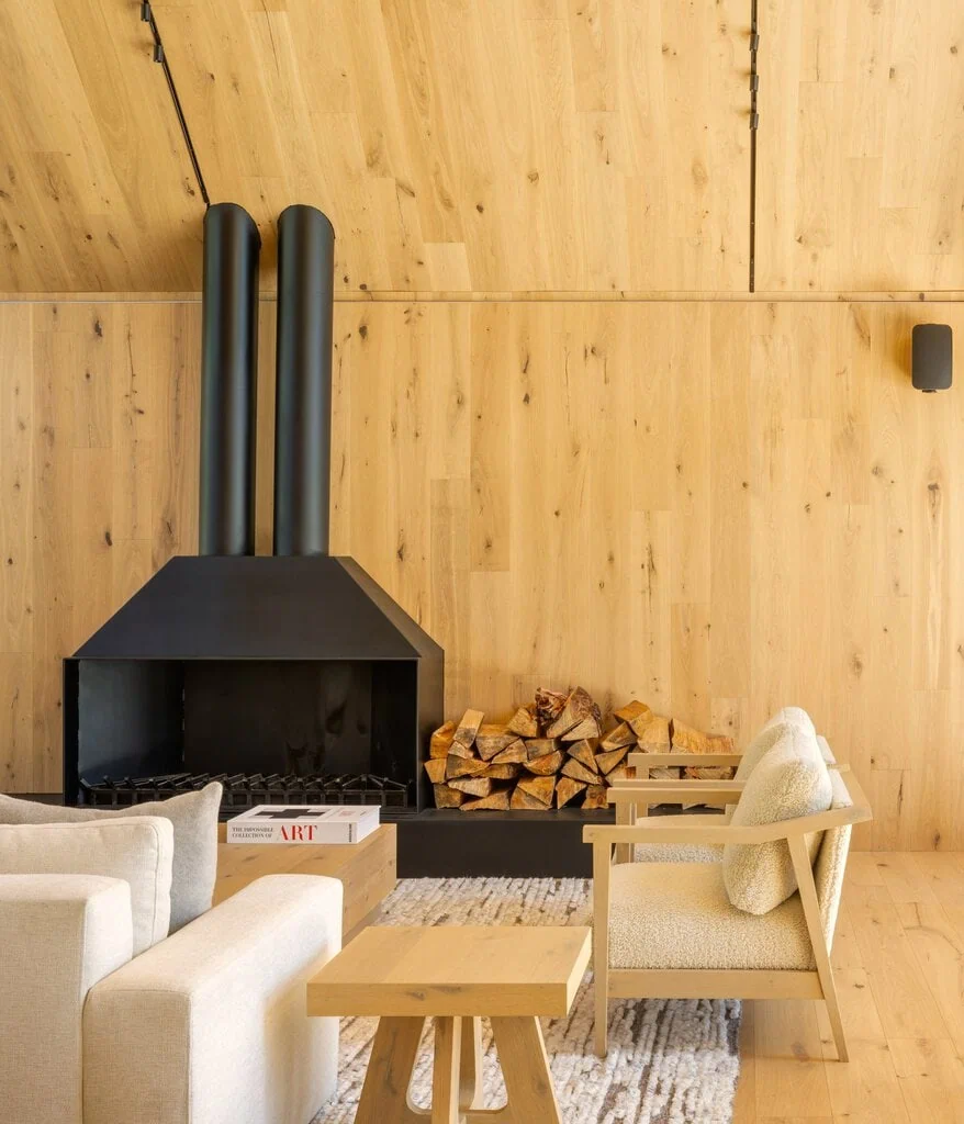 A large wood-burning stove is located in the living room