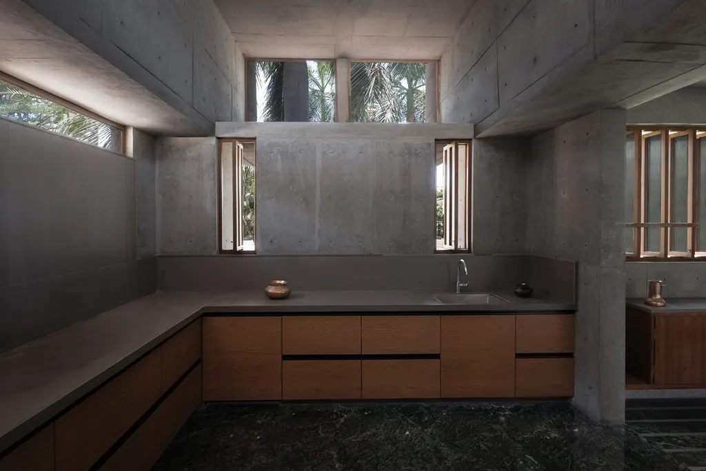 Concrete surfaces give the home a monolothic appearance