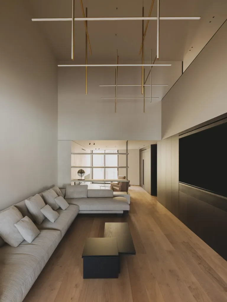 A double-height living room lies at the heart of the house