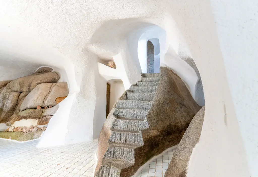 The main staircase is carved from the granite