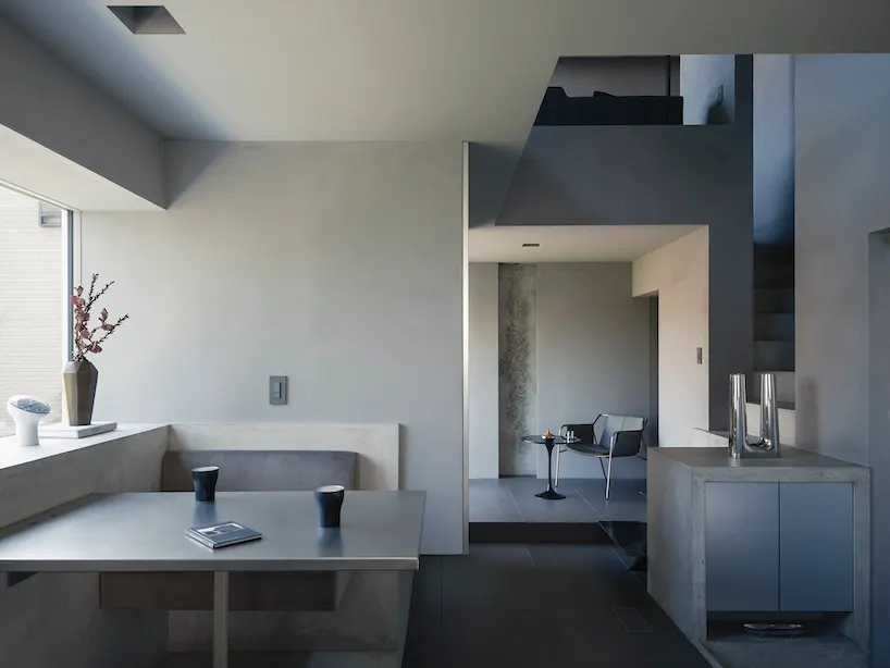the kitchen and dining areas occupy the first floor of the main building