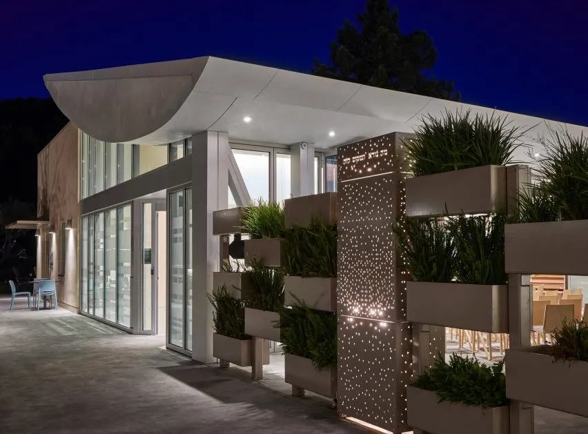 An outdoor courtyard leads to the smaller Beit Midrash
