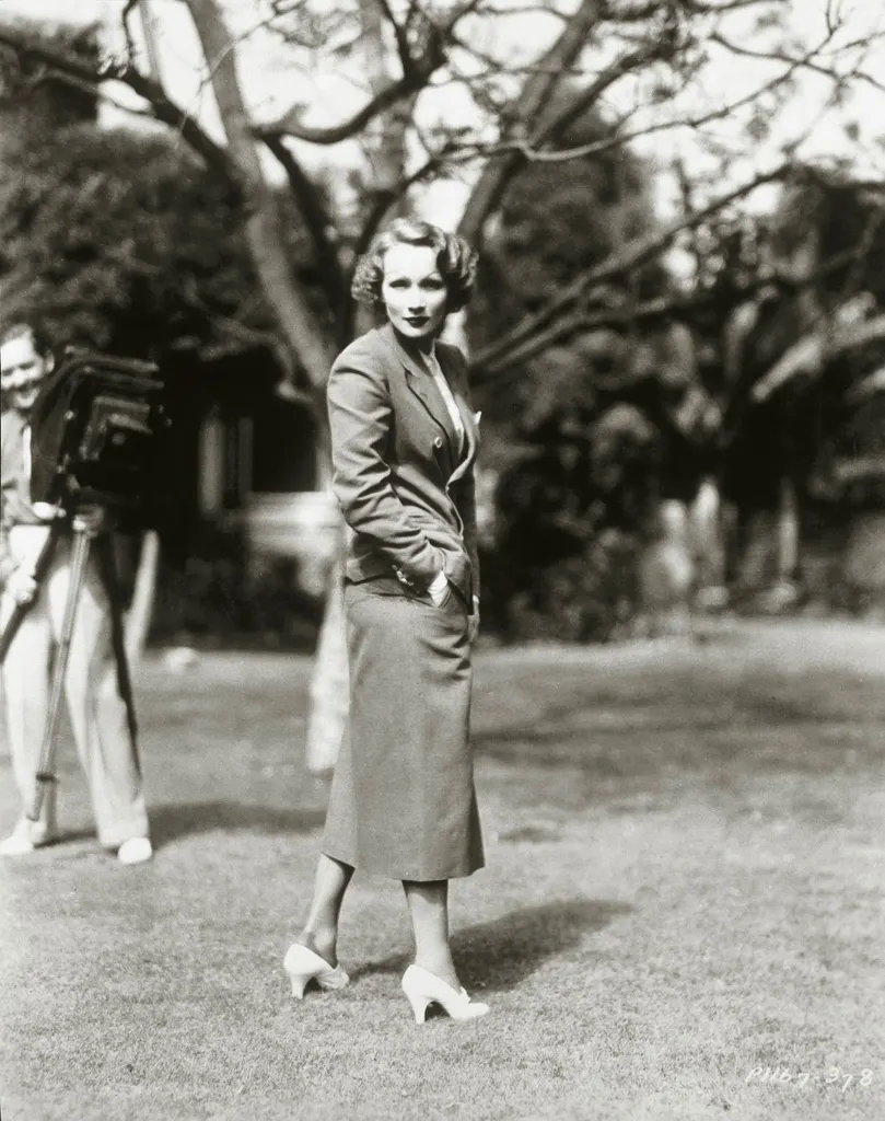 blackandwhite photo of Marlene Dietrich on lawn