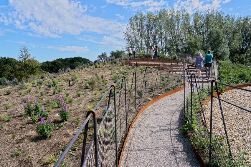 The rooftop is accessible and covered with plants