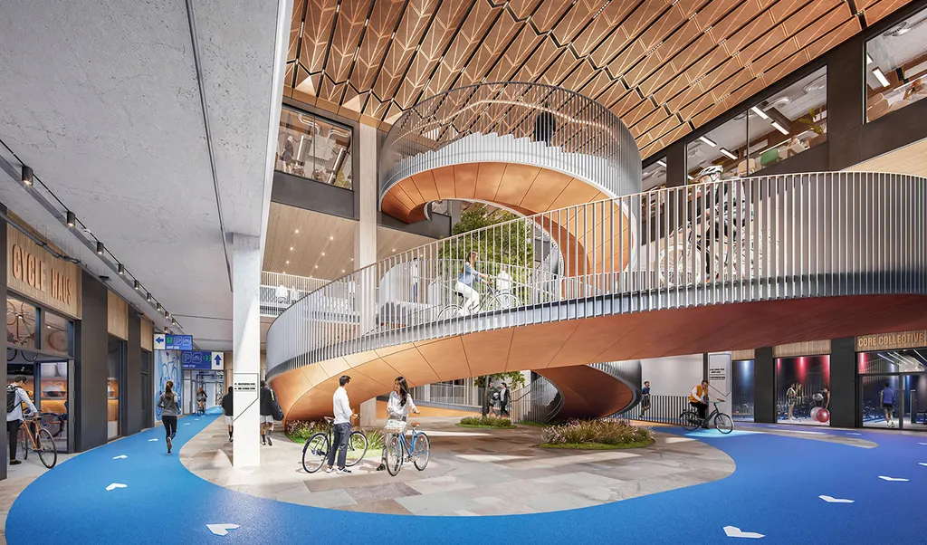 BGO’s ‘village square’ atrium with bicycle ramp. Photography: courtesy of BGO