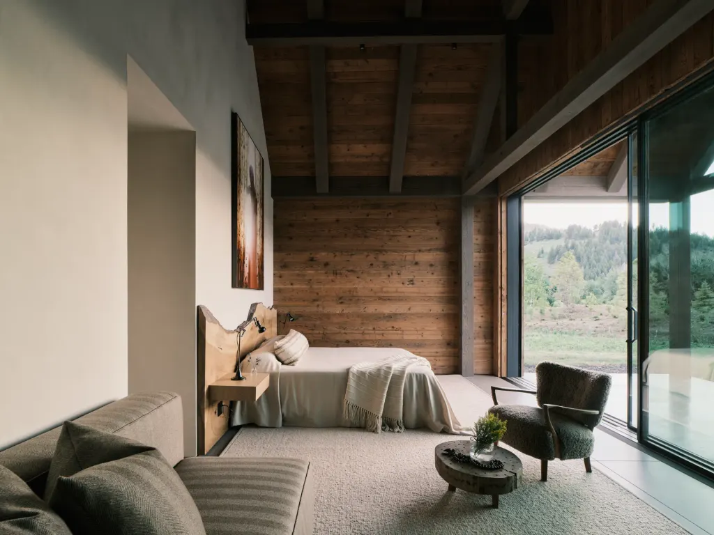 Three Barns by Field Architecture, a rural american home designed to look like a collection of old wooden barns